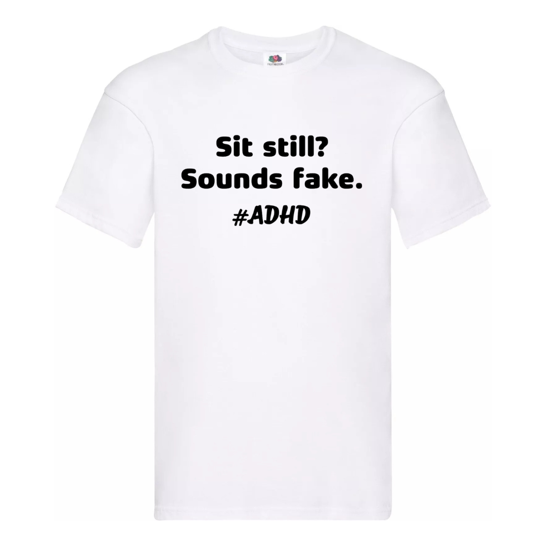 "SIT STILL? SOUNDS FAKE. #ADHD" TEE — (MEN’S FIT)