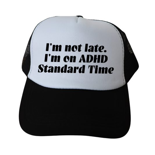 "I’M NOT LATE. I’M ON ADHD STANDARD TIME." Trucker cap — Black & White