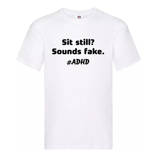 "SIT STILL? SOUNDS FAKE. #ADHD" TEE — (MEN’S FIT)